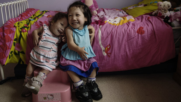 Briella, 4, and Maddy, 7, share a rare genetic disorder, diastrophic dysplasia, that has affected their growth and caused spinal deformities.