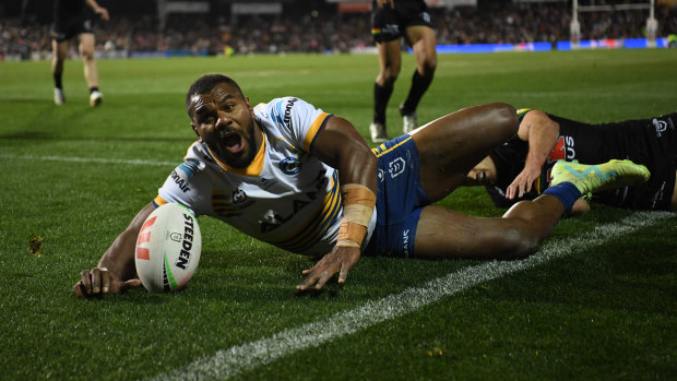 Maika Sivo scores a try during his first-half hat-trick.