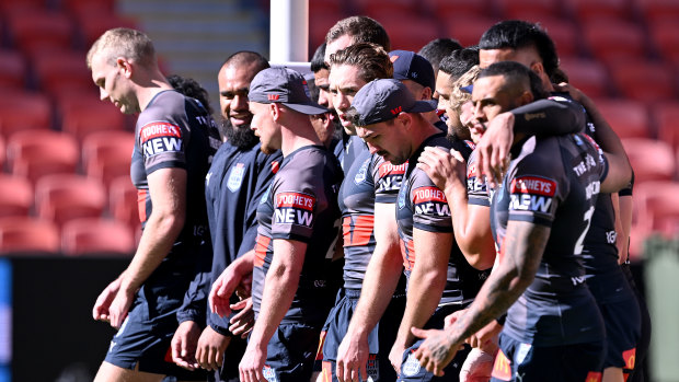 NSW Blues players complete their captain’s run at Suncorp Stadium on Tuesday.