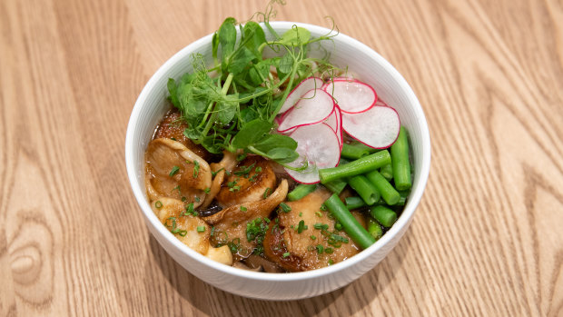 The mushroom udon is topped with  king brown mushrooms that are  fried like scallops.