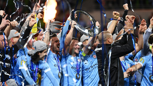 Scott Jamieson leads the Melbourne City celebrations.