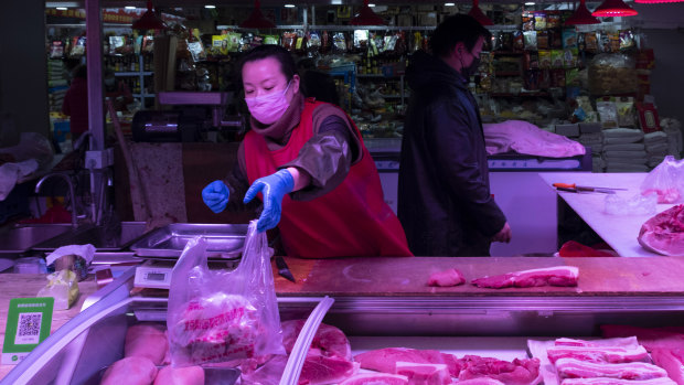 Li Huiying, 36, a butcher at a suburban market in eastern Beijing