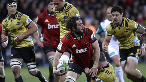 Dominant: Sam Whitelock looks for support runners in Christchurch.