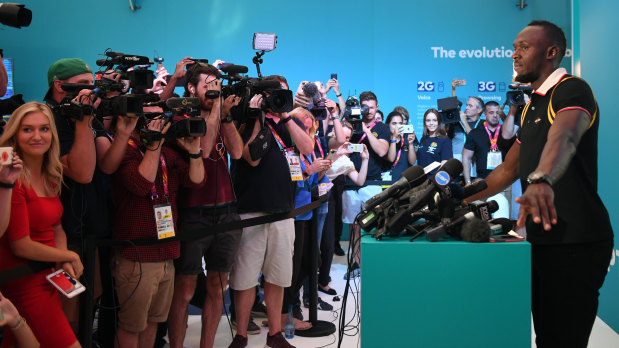Showstopper: The Commonwealth Games press contingent dropped what they were doing for Bolt.