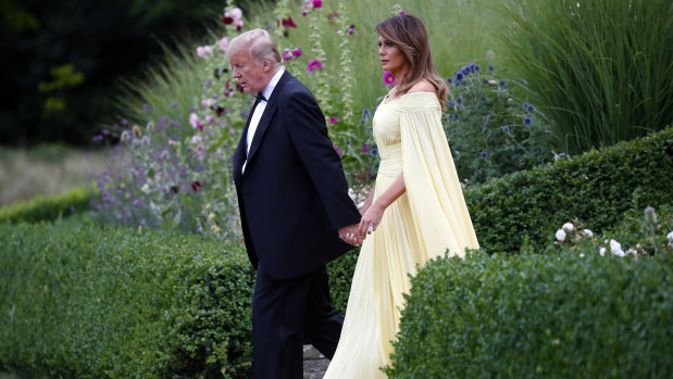 US President Donald Trump and first lady Melania Trump leave Winfield House, residence of the US ambassador, before boarding Marine One helicopter for the flight to nearby Blenheim Palace.
