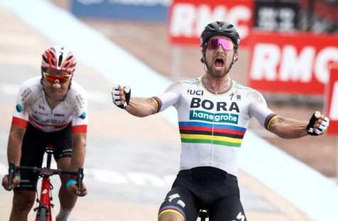 Bora–Hansgrohe rider Peter Sagan, from Slovakia, beats AG2R La Mondiale's Swiss rider Silvan Dillier in a sprint finish inside the velodrome in Roubaix.