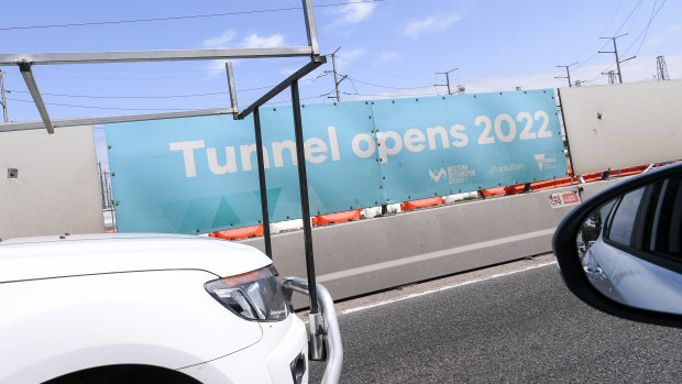 West Gate Tunnel signs on the West Gate Freeway advertising its completion in 2022.