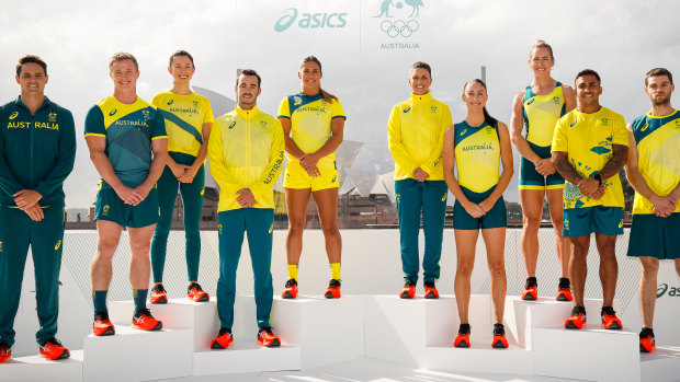 Australian athletes pose during the Olympic uniform unveiling at the Overseas Passenger Terminal.