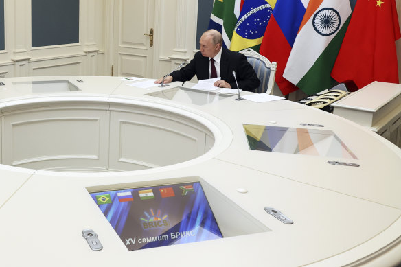 Russian President Vladimir Putin attends the BRICS group of emerging economies three-day summit in Johannesburg, South Africa via videoconference from Moscow, Russia.