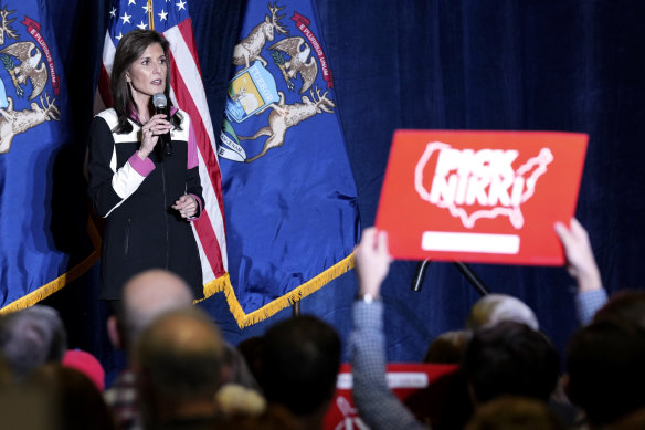 Republican presidential candidate former US ambassador to the UN Nikki Haley speaks with attendees at a campaign rally on Monday in Grand Rapids, Michigan.