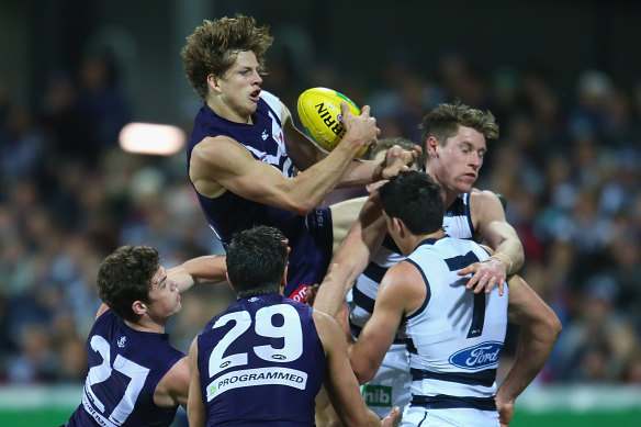 Nathan Fyfe of the Dockers takes a mark.