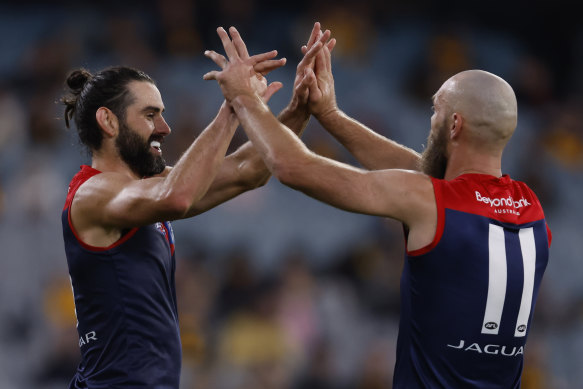 Brodie Grundy celebrates with Demons skipper Max Gawn after they combined for a goal against Hawthorn.