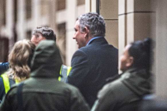 Greg Lynn is led away after being sentenced to 32 years’ prison on Friday.