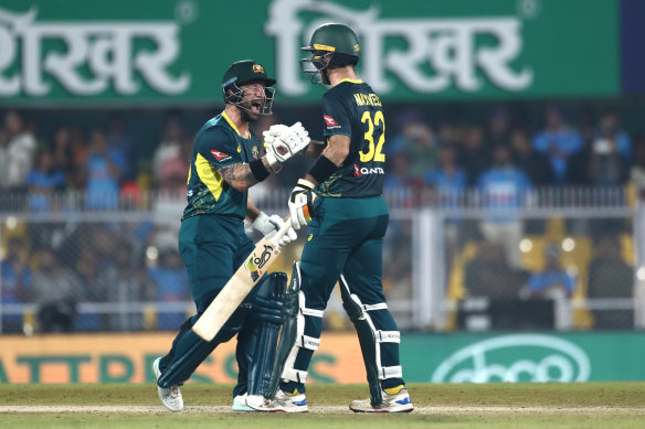 Matthew Wade (left) celebrates the narrowest of victories with Glenn Maxwell.