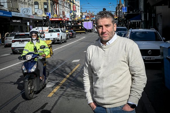 Sam Aldemir, owner of De Barcelona cafe in Hawthorn, is encouraging delivery riders to stay on the road.