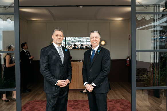 Crown Melbourne chief executive Mike Volkert, right, and former Crown Resorts chief executive Ciaran Carruthers at Flemington.