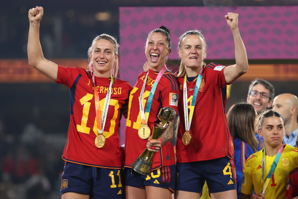 Spain’s Alexia Putellas, Jennifer Hermoso and Irene Paredes celebrate after defeating England in the final.