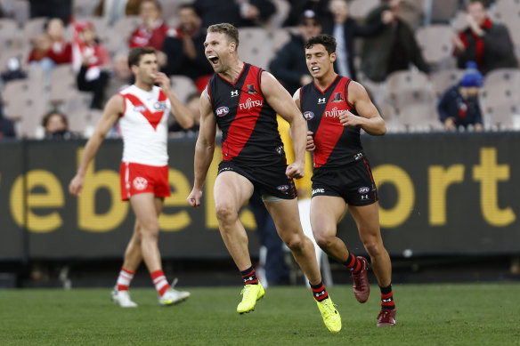 Jake Stringer celebrates one of his two goals in the Bombers’ clash against Sydney.