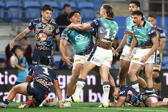 Jason Taumalolo celebrates a try against the Titans.