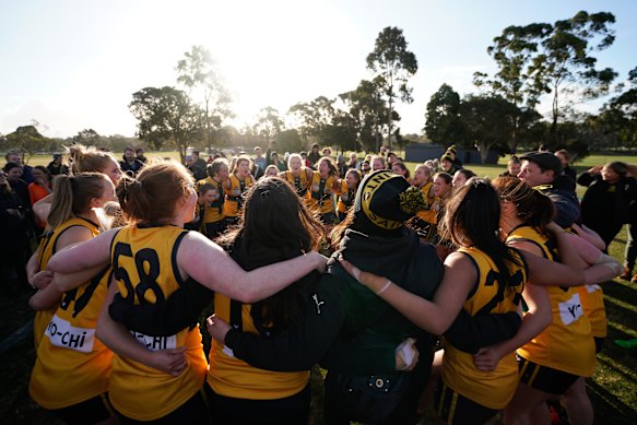 St Mary's women's team celebrate winning the B-grade premiership in 2018.