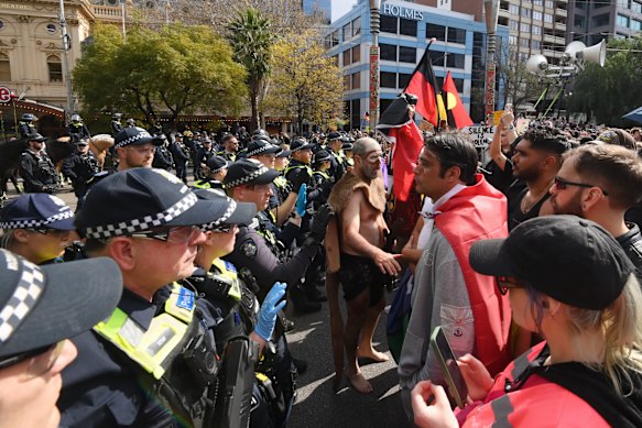 Save Australia and Rally Against Racism protests take over Melbourne CBD
