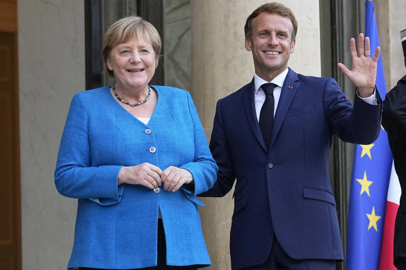 Dr Merkel with French President Emmanuel Macron in Paris this month.