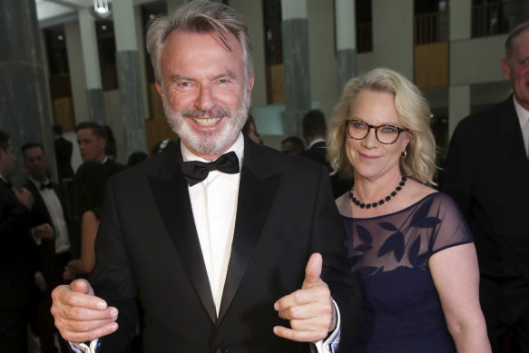 Neill and Laura Tingle arrive for the Mid Winter Ball at Parliament House in  2018.