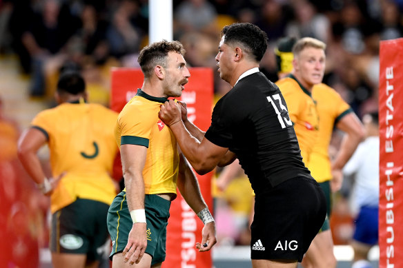 Getting shirty: Nic White and All Black Anton Lienert-Brown square up.