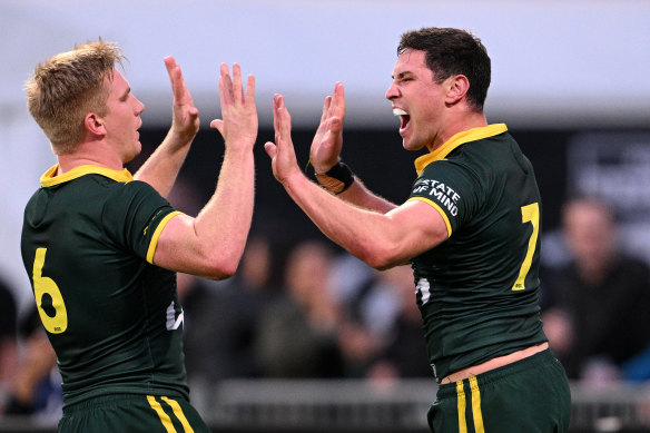 Mitch Moses and Tom Dearden celebrate.