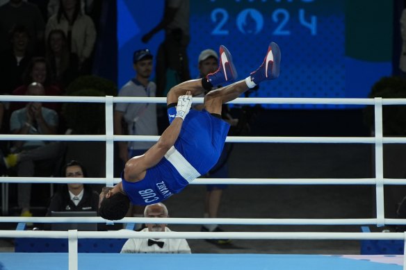 Cuba’s latest Olympic boxing champion Erislandy Alvarez Borges jumps for joy after defeating France’s Sofiane Oumiha.