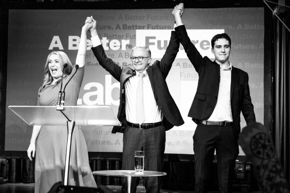 Albanese claims victory with his partner Jodie Haydon and son Nathan by his side.