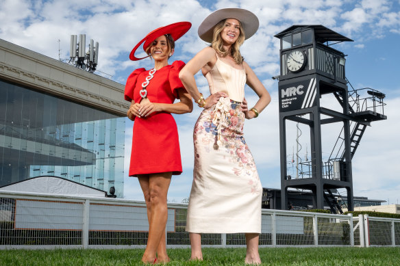 MRC ambassador Lana Wilkinson in Rebecca Vallance and model Amy Pejkovic in Zimmermann at Caulfield Racecourse ahead of the Caulfield Cup.