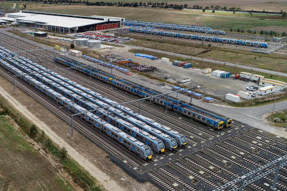 Some of the new High-Capacity Metro Trains sitting unused in a specially built Pakenham East rail yard.