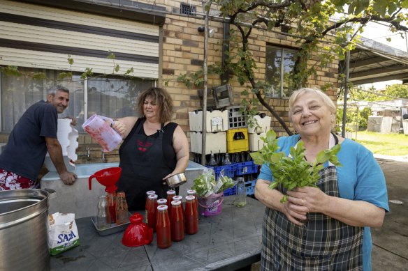 Teresa Recce (centre) with her husband Gerardo and mum Maria D’Amelio as they prepare for passata day on Sunday.