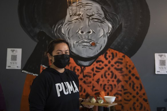 Jenny Le, manager at Saigon Street Eats in Balaclava, is looking forward to mask rules lifting in hospitality.