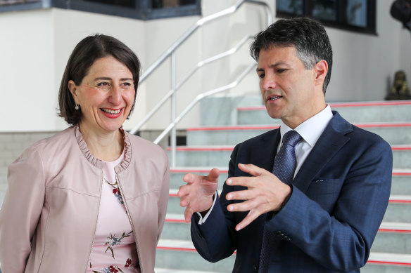 NSW Customer Service Minister Victor Dominello, seen with Premier Gladys Berejiklian, says the state government is researching the development of a national digital birth certificate.