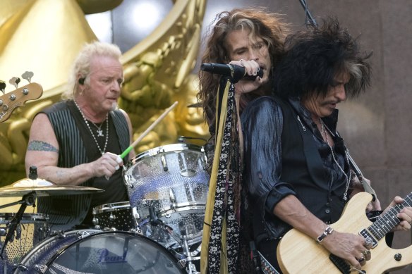 Joey Kramer, far left, performing with Steven Tyler and Joe Perry of Aerosmith in 2018.
