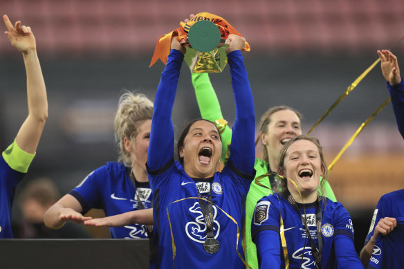 Chelsea’s Sam Kerr with the FA Women’s League Cup at Vicarage Road on Sunday.