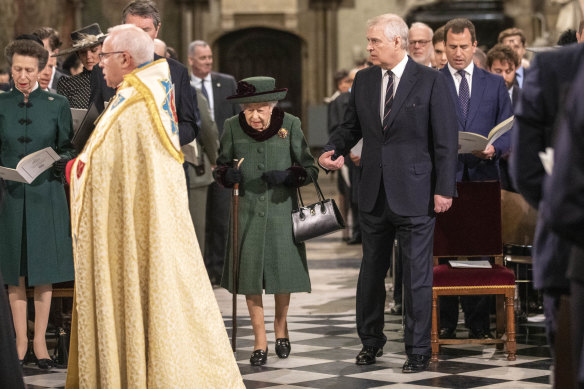 Britain’s Queen Elizabeth II and Prince Andrew arrive for a Service of Thanksgiving for the life of Prince Philip, Duke of Edinburgh, at Westminster Abbey in London.