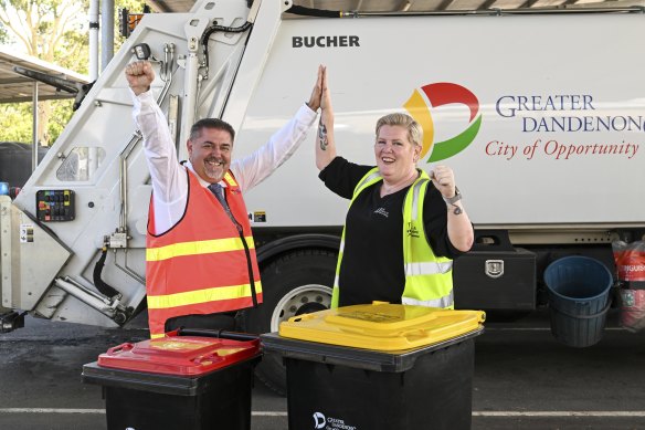 Greater Dandenong councillor Jim Memeti and JJ Richards domestic contract manager Lisa Fox with one of the council’s compacter trucks at its operation centre on Wednesday. 