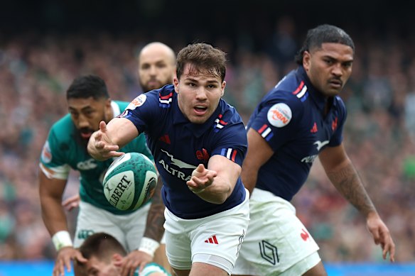 Antoine Dupont passes the ball during the Six Nations against Ireland.