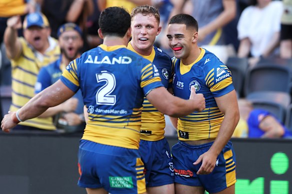 Eels celebrate Tallyn Da Silva's (right) try.
