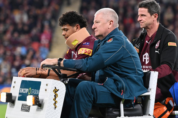 Selwyn Cobbo leaves Suncorp Stadium on a medicab after three minutes of the 2022 decider.
