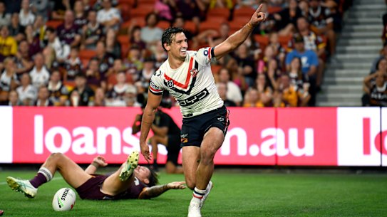 Billy Smith celebrates scoring for the Sydney Roosters against the Brisbane Broncos.