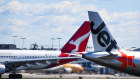 Qantas and Jetstar aircraft at Sydney airport.