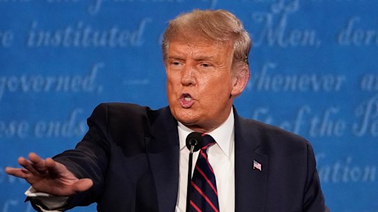 US President Donald Trump gestures while speaking.