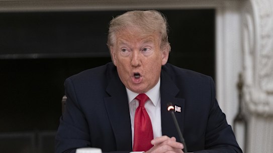 President Donald Trump warns protesters they face a "much different scene" at his rally 