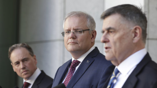 Health Minister Greg Hunt, Prime Minister Scott Morrison and Chief Medical Officer Brendan Murphy,