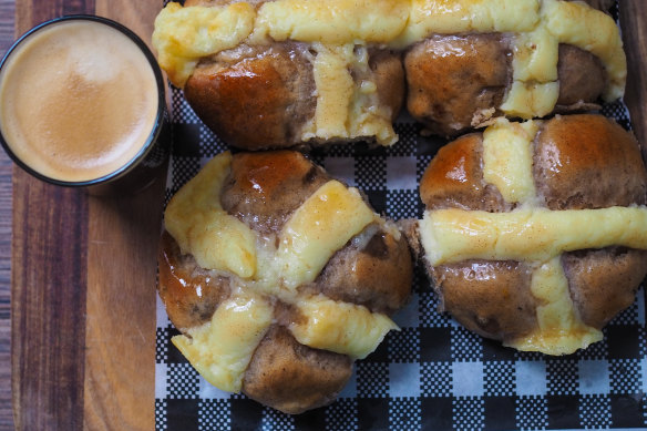 One More Chocolate hot cross buns with port wine soaked fruit and Tahitian vanilla creme patisserie cross.