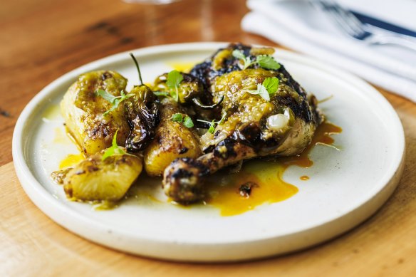 Pollo con yuca: wood-fired chicken with tomatillo salsa and yuca.